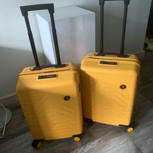 Bric’s B/Y yellow hard shell travel luggage